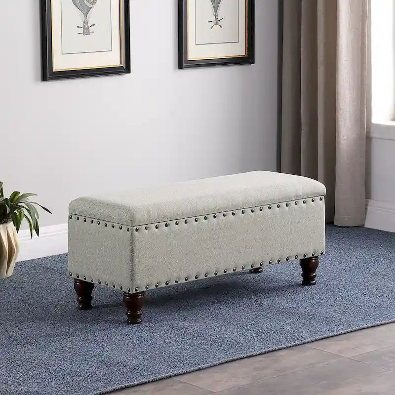 Banc de rangement capitonné avec clous décoratifs en bronze, couvercle à charnière et pieds en bois – Plusieurs coloris