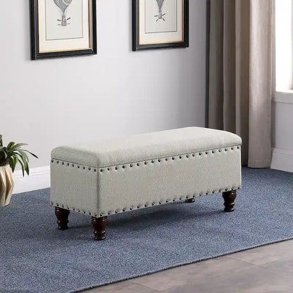 Banc de rangement capitonné avec clous décoratifs en bronze, couvercle à charnière et pieds en bois – Plusieurs coloris